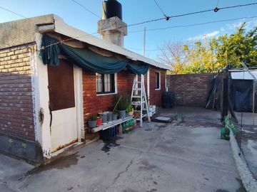 CASA CON DEPARTAMENTO CON AMPLIACION PARA LOCAL