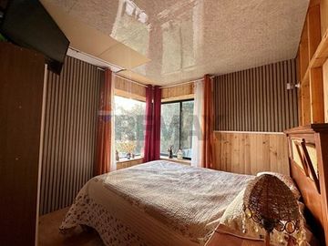 Parcela 900 m² con acogedora casa en Vichuquén