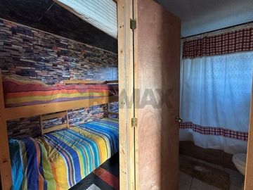 Parcela 900 m² con acogedora casa en Vichuquén