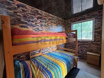Parcela 900 m² con acogedora casa en Vichuquén