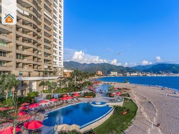 Departamento amueblado frente al mar en venta en Grand Venetian Puerto Vallarta