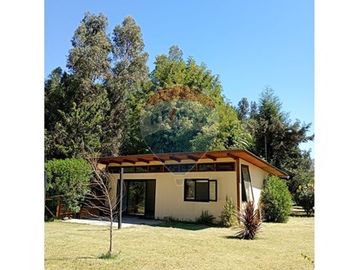Parcela con dos casas en Champa: ¡Un Sueño!