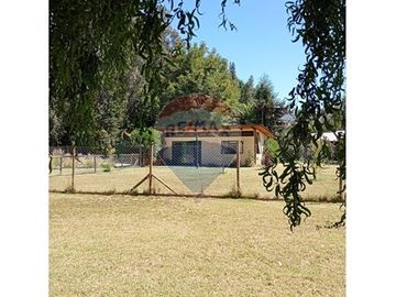 Parcela con dos casas en Champa: ¡Un Sueño!