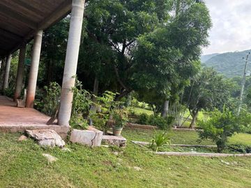 Rancho con casa de Campo y cultivo