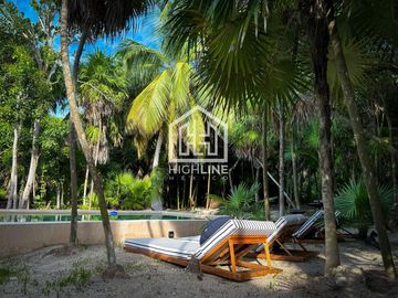 VILLA EN VENTA EN TULUM FRENTE A A LA PLAYA CON ALBERCA ROI EXCLUSIVA AMUEBLADA Y EQUIPADA