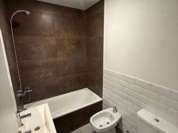VENTA 2 AMBIENTES CON PATIO CON JARDIN EN LAGOON