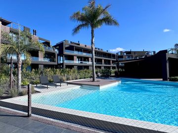 Venta departm 2 ambientes Milenia Nordelta cochera