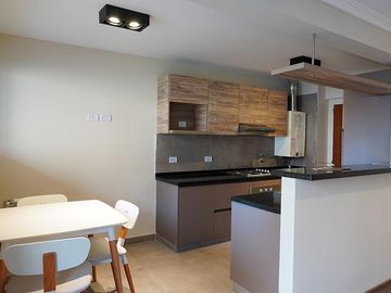 Departamento de 2 dormitorios con radiadores en zona rio de excelente calidad constructiva