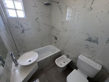 VENTA DE DEPARTAMENTO 3 AMBIENTES A ESTRENAR EN FLORES CON COCHERA