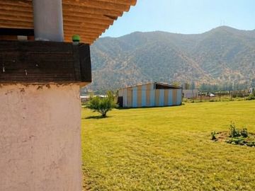 En venta, parcela de 5.000 m2., con casa de 2 dormitorios, en El Melón, Nogales.  100 M$