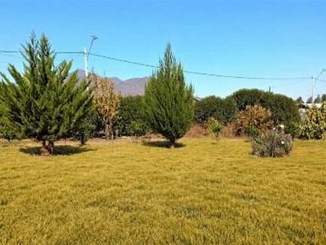 En venta, parcela de 5.000 m2., con casa de 2 dormitorios, en El Melón, Nogales.  100 M$