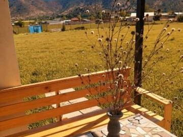 En venta, parcela de 5.000 m2., con casa de 2 dormitorios, en El Melón, Nogales.  100 M$