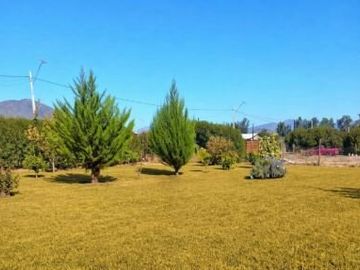 En venta, parcela de 5.000 m2., con casa de 2 dormitorios, en El Melón, Nogales.  100 M$