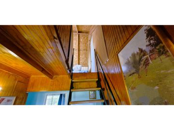 Venta parcela de 18.000 m2., casa, cabaña y galpón, con maquinaria de maestranza, en La Calera. 21.308 UF.