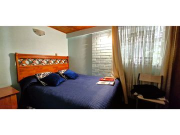 Venta parcela de 18.000 m2., casa, cabaña y galpón, con maquinaria de maestranza, en La Calera. 21.308 UF.