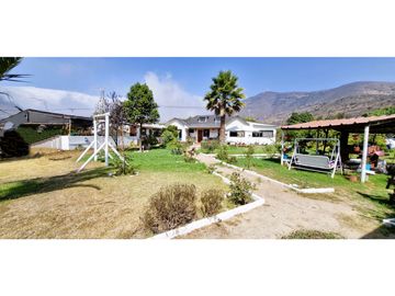 Venta parcela de 18.000 m2., casa, cabaña y galpón, con maquinaria de maestranza, en La Calera. 21.308 UF.