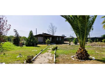 Venta parcela de 18.000 m2., casa, cabaña y galpón, con maquinaria de maestranza, en La Calera. 21.308 UF.