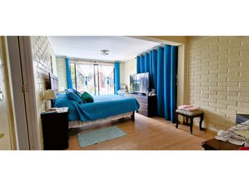Venta parcela de 18.000 m2., casa, cabaña y galpón, con maquinaria de maestranza, en La Calera. 21.308 UF.