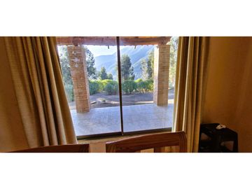 Venta de parcela de 15.000 m2., con casa, quincho y piscina, en Pucalán. 200 M$