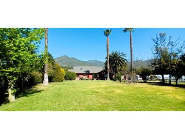 Venta de parcela de 6.000 m2. En San Isidro de Quillota -  casa de 240 m2. 12.036 UF.