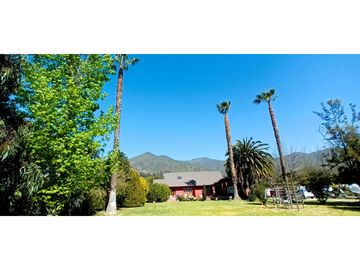 Venta de parcela de 6.000 m2. En San Isidro de Quillota -  casa de 240 m2. 12.036 UF.