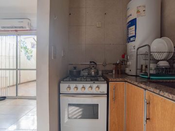 VENTA DEPTO 2 AMBIENTES CON PATIO REM ESCALADA