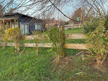 Terreno con galpón, 2 cabañas y vista al volcán