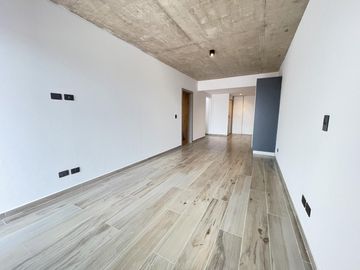 Departamento monoambiente con balcón y terraza