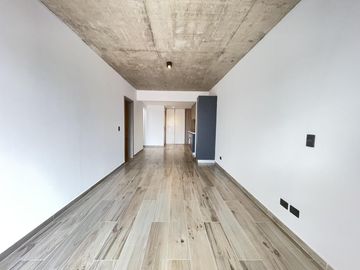 Departamento monoambiente con balcón y terraza