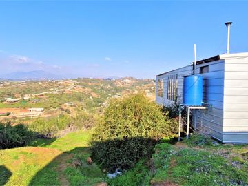 Parcela con casa en venta en Limache, 5.000 m2. - 125 M$