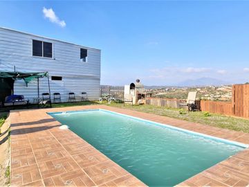 Parcela con casa en venta en Limache, 5.000 m2. - 125 M$