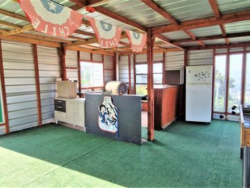 Parcela con casa en venta en Limache, 5.000 m2. - 125 M$