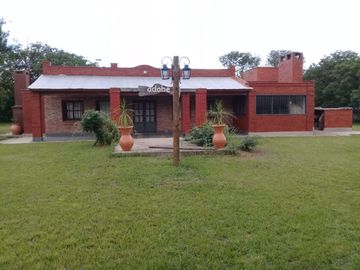 1 HECTAREA EN FALDA DEL CARMEN CON UNA CASA 200 M2
