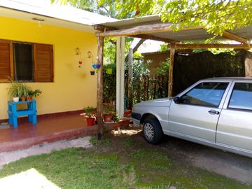 VENTA 2 CASAS SOBRE CAMINO FALDA DEL CARMEN