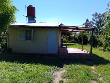 VENTA 2 CASAS SOBRE CAMINO FALDA DEL CARMEN