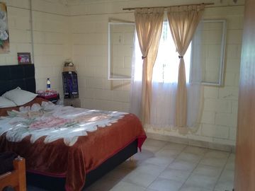 VENTA 2 CASAS SOBRE CAMINO FALDA DEL CARMEN