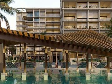 Condominio cerca del mar con terraza, asador y barra de entretenimiento