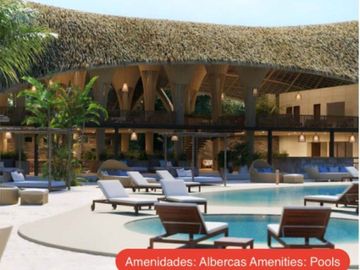 Casa de dos niveles con piscina privada, terraza, patio, bar, bodega.