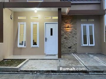 Rumah Modern Dan Berkualitas turun harga lokasi pinggir jalan
