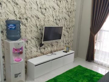 Apartemen Puncak Dharmahusada Full Furnish Hadap utara