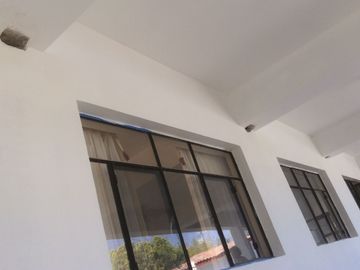 EN ZONA DE AGUAS TERMALES PROPIEDAD COMERCIAL