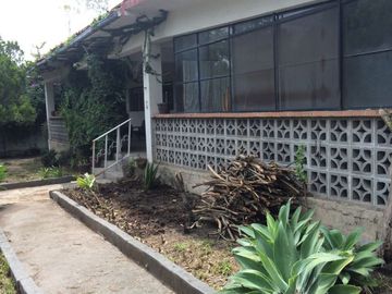 EN ZONA DE AGUAS TERMALES PROPIEDAD COMERCIAL