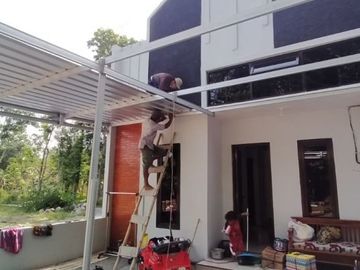 DIJUAL RUMAH DESAIN MODERN TROPICAL DEKAT TOL MANISRENGGO
