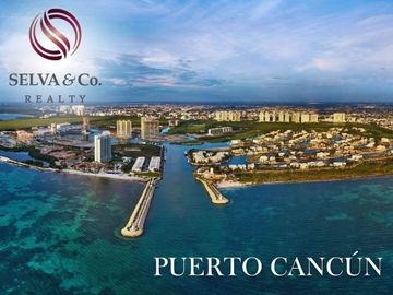 Departamento con jardín privado, vista al mar y la marina. Ademas de amenidades