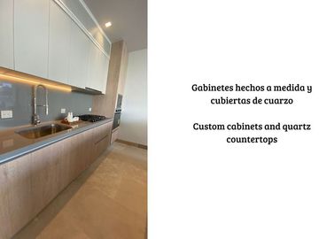 Departamento con jardín privado, vista al mar y la marina. Ademas de amenidades