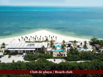 Departamento con jardín privado, vista al mar y la marina. Ademas de amenidades