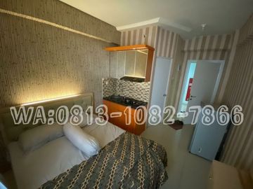 Studio apartemen full furnish green pramuka tahunan free IPL