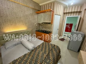 Studio apartemen full furnish green pramuka tahunan free IPL