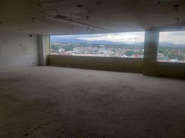 Sierra Vertientes, obra gris, enormes espacios