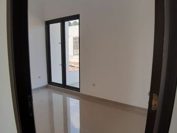 Rumah cluster siap huni fasilitas swimming pool sawangan